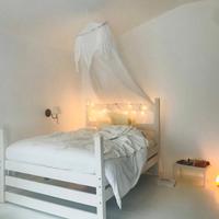 Letto di legno con doghe