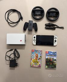Switch OLED + 2 giochi + volanti + sd 128gb
