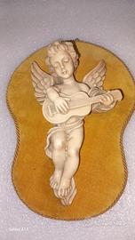 Putto con chitarra