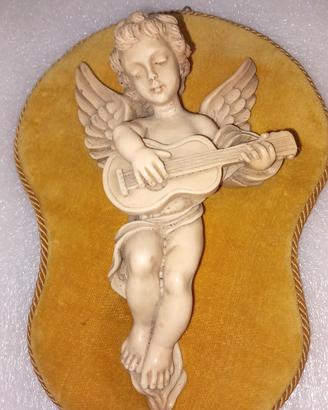 Putto con chitarra