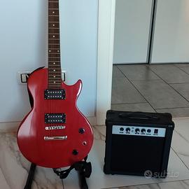 Chitarra elettrica con amplificatore e sostegno 