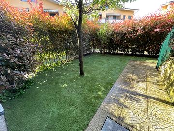 Ampio trilocale con giardino