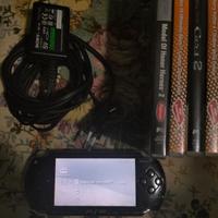 PSP + 4 giochi e caricatore
