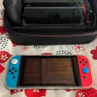 Nintendo switch +accessori + 2 giochi 