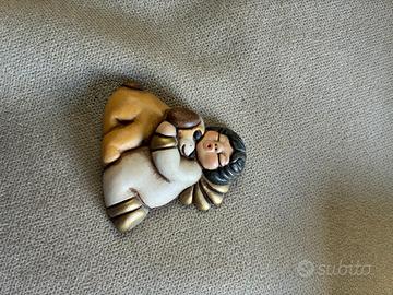 calamita angioletto con cane Thun
