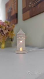 Lampada in pietra leccese