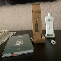 Oliera in ceraica e libro