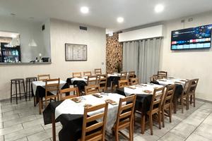 Pizzeria con cucina,braceria e forno a legna 150mq
