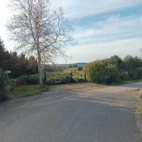 Terreno recintato con ingresso su strada asfaltata