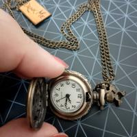 Orologio da tasca con ciondolo Drink Me