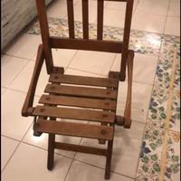 Sediolina pieghevole in legno vintage