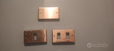 Placche in ottone per interruttori 