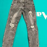 Jeans skinny strappato