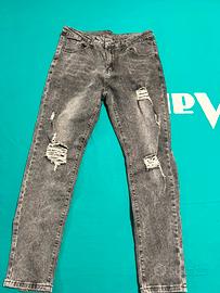 Jeans skinny strappato