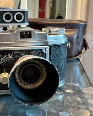 Fotocamera finetta con cistodia per parti ricambio