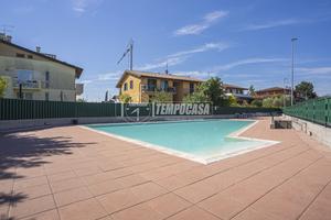 TRILOCALE CON GIARDINO, TAVERNA E BOX IN RESIDENCE