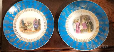Coppia di piatti decorativi in porcellana