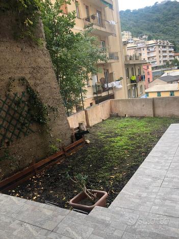 Quezzi arredato con giardino