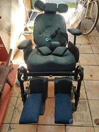 Carrozzina polifunzionale basculante