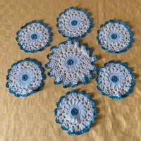Centrini ricamati a mano