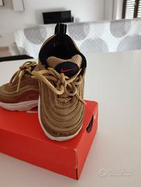 Nike Gold bambino/a