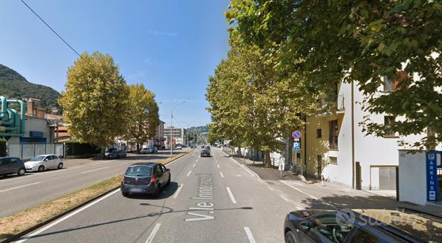 Ampio bilocale como borghi con posto auto libero