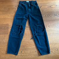 Jeans larghi strappati a vita alta Neri