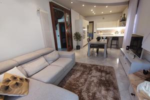 Porzione di casa bifamiliare con giardino