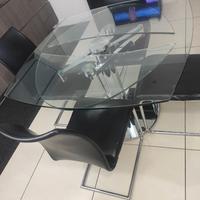TAVOLO IN CRISTALLO CON PIEDE IN ACCIAIO