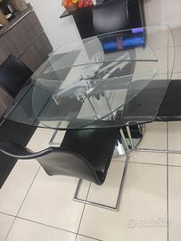 TAVOLO IN CRISTALLO CON PIEDE IN ACCIAIO