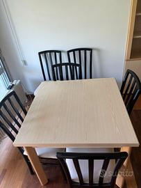 tavolo da pranzo con sei sedie