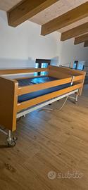 letto elettrico articolato con materasso