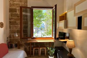 Elegante Loft in Piazza Sulis con vista mare