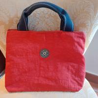 borsa rossa con manici neri