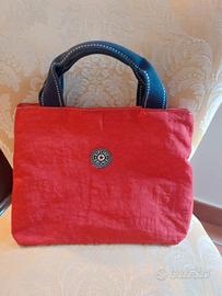 borsa rossa con manici neri