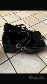 Scarpe nere con cinturino