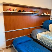 cameretta completa con 3 letti a doghe