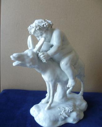 Porcellana  statuina Capodimonte satiro con mulo
