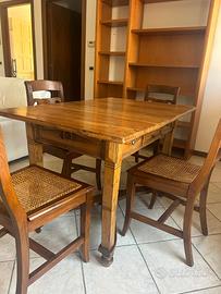 Tavolo e sedie stile rustico