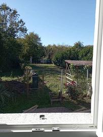 BILOCALE RISTRUTTURATO CON TERRENO A DUE PASSI DA