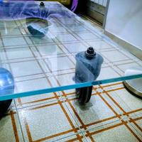 tavolo in vetro disegno Gae Aulenti 