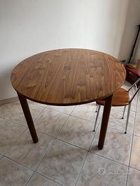 Tavolo rotondo da cucina apribile con allunghe.