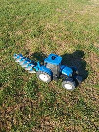 trattore giocattoli della Bruder con aratro 