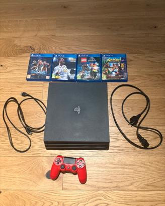ps4 pro, con 4 giochi e joistick