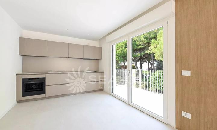 A Lignano Sabbiadoro trilocale con riscaldamento