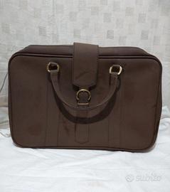 valigia vintage in pelle marrone