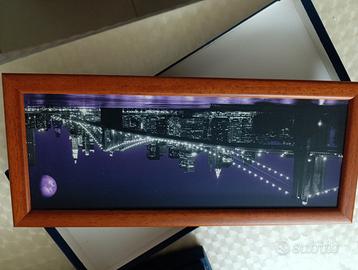 Quadro con cornice in legno