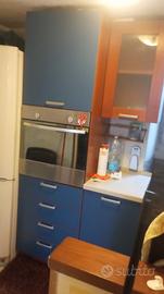 cucina ,parete attrezzata e comò lavatrice 