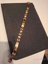 Braccialetto oro 18k giallo e bianco. marca Quadri