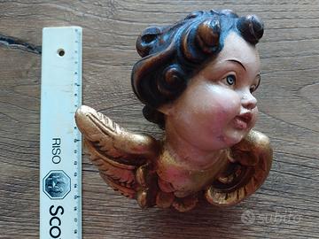Testa di angelo sinistra 15 cm in legno